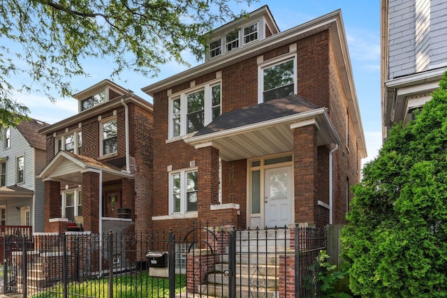 2507 W 45th Pl, Chicago, IL 60632 - american foursquare style home featuring brick siding and a fenced front yard