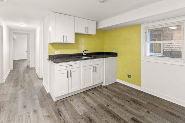 2507 W 45th Pl, Chicago, IL 60632 - kitchen featuring white cabinetry and light wood-style flooring
