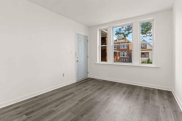 2507 W 45th Pl, Chicago, IL 60632 - unfurnished room featuring dark wood-type flooring