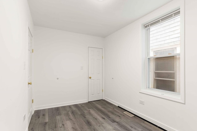 2507 W 45th Pl, Chicago, IL 60632 - spare room featuring wood finished floors and baseboards
