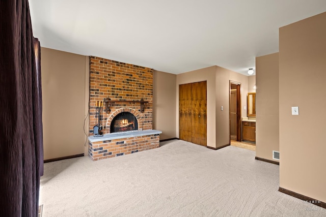 294 Apache Trl, Lake In The Hills, IL 60156 - unfurnished living room with light carpet and a fireplace