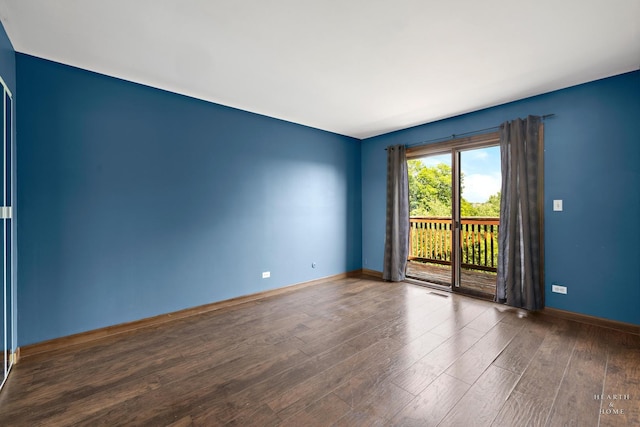 294 Apache Trl, Lake In The Hills, IL 60156 - empty room with wood finished floors and baseboards