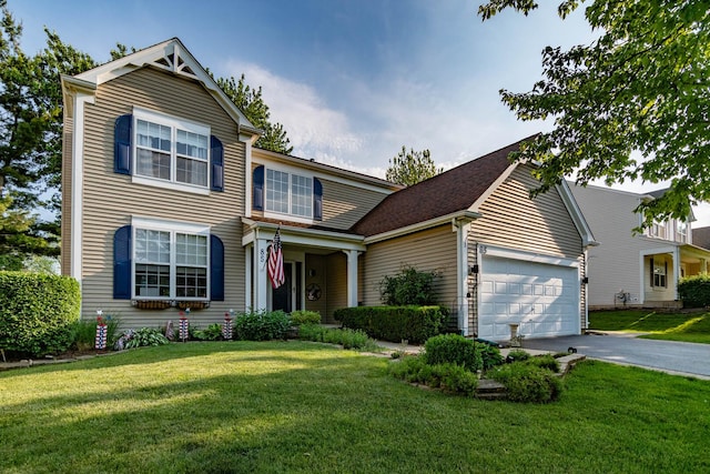 85 Fieldstone Dr, Lake Villa, IL 60046 - traditional home featuring asphalt driveway, a garage, and a front yard