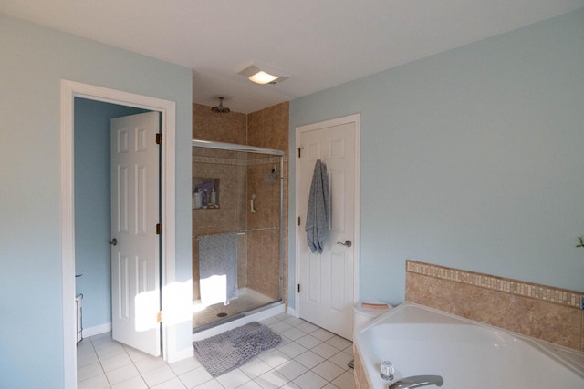 85 Fieldstone Dr, Lake Villa, IL 60046 - full bathroom featuring a stall shower, a bath, and tile patterned flooring