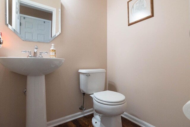 85 Fieldstone Dr, Lake Villa, IL 60046 - half bathroom featuring toilet and wood finished floors
