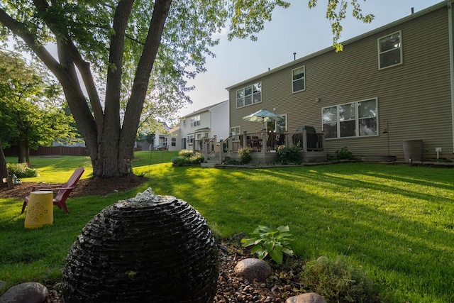 85 Fieldstone Dr, Lake Villa, IL 60046 - back of house featuring a wooden deck and a yard