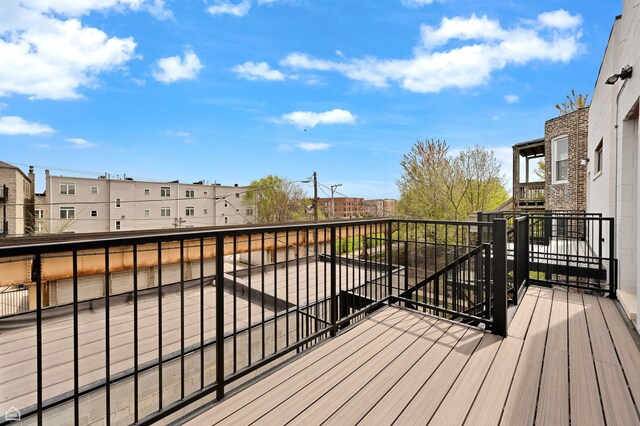 4435 S Prairie Ave, Chicago, IL 60653 - wooden deck featuring a residential view
