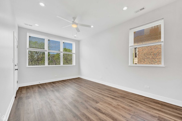 4435 S Prairie Ave, Chicago, IL 60653 - unfurnished room featuring wood finished floors, ceiling fan, and recessed lighting