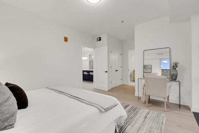 3204 N Kostner Ave Unit 301, Chicago, IL 60641 - bedroom featuring light wood-style flooring