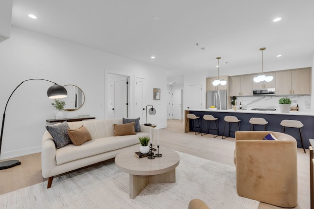 3204 N Kostner Ave Unit 301, Chicago, IL 60641 - living room featuring recessed lighting and light wood finished floors