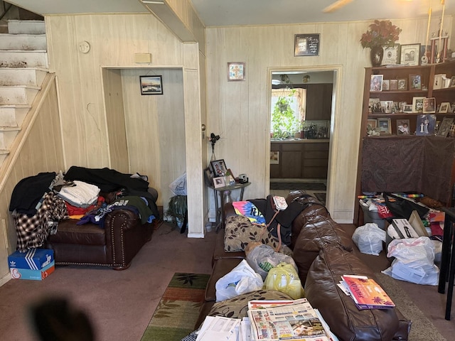 526 Gardner St, Joliet, IL 60433 - carpeted living area with wooden walls and stairs
