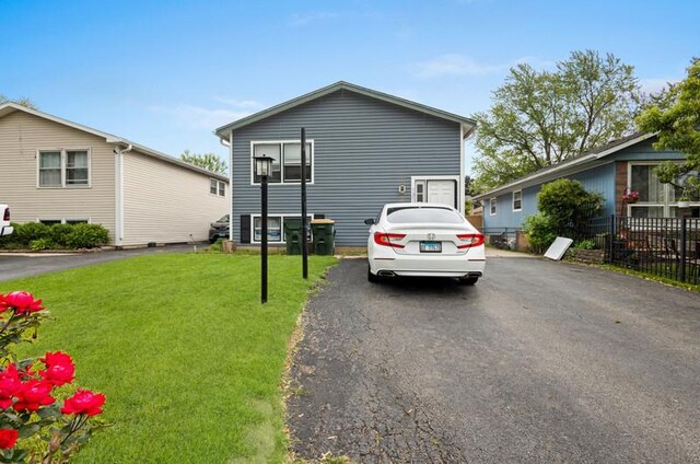 1311 Juneway Ter, Round Lake Beach, IL 60073 - view of front of property with asphalt driveway