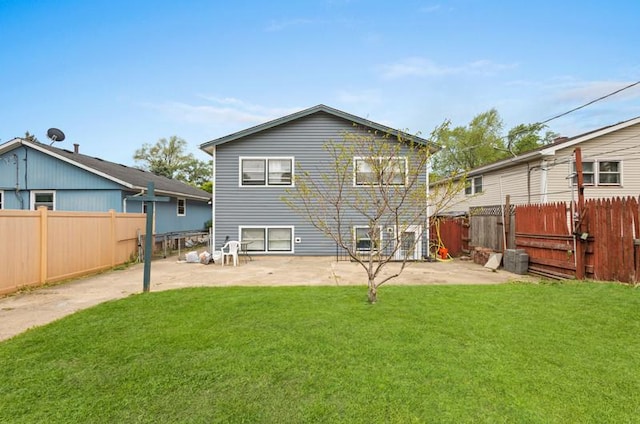 1311 Juneway Ter, Round Lake Beach, IL 60073 - rear view of property with a patio and a fenced backyard