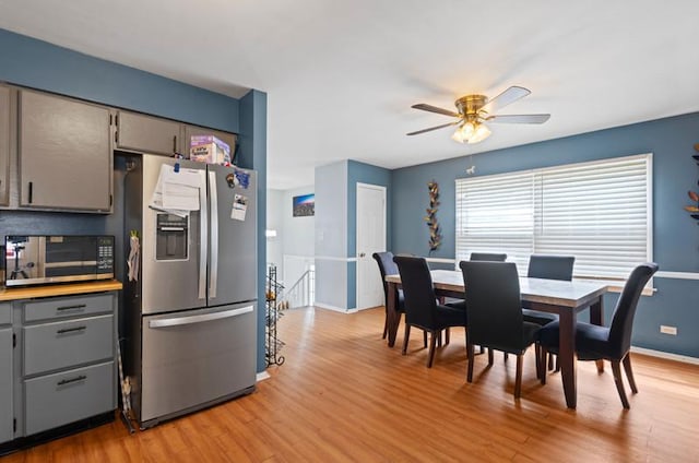1311 Juneway Ter, Round Lake Beach, IL 60073 - dining room featuring light wood-style flooring and a ceiling fan