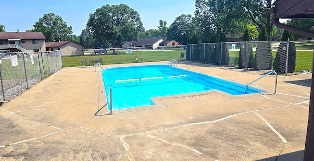1303 Christopher Cir Unit 8, Urbana, IL 61802 - community pool with a patio area and view of wooded area