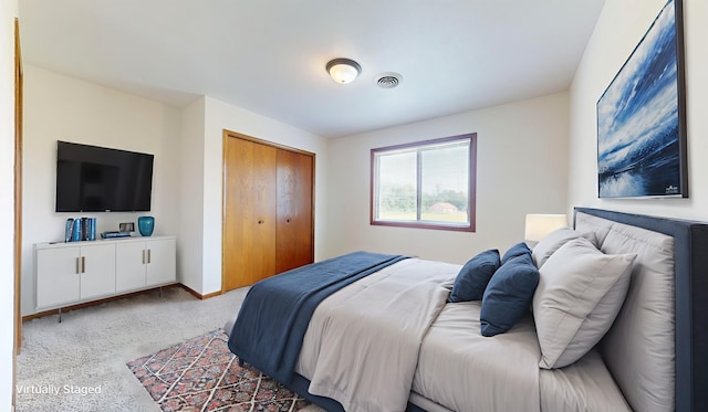 1303 Christopher Cir Unit 8, Urbana, IL 61802 - carpeted bedroom featuring a closet and baseboards