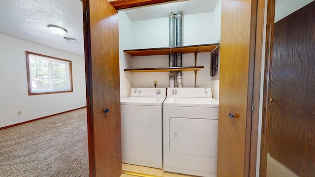 1303 Christopher Cir Unit 8, Urbana, IL 61802 - laundry room with washer and clothes dryer and light carpet