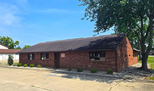 1303 Christopher Cir Unit 8, Urbana, IL 61802 - view of front of house with brick siding and roof with shingles