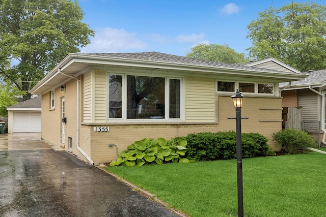 1355 S Highland Ave, Arlington Heights, IL 60005 - view of front of property featuring brick siding, an outdoor structure, a front yard, a garage, and a shingled roof