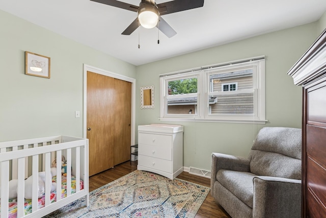 1355 S Highland Ave, Arlington Heights, IL 60005 - bedroom with wood finished floors, a closet, a ceiling fan, and a nursery area