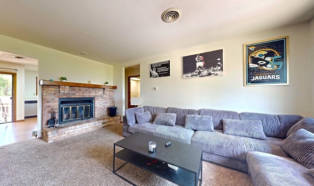 1301 Clifford Ave Unit 8, Urbana, IL 61802 - living area with a fireplace and carpet flooring