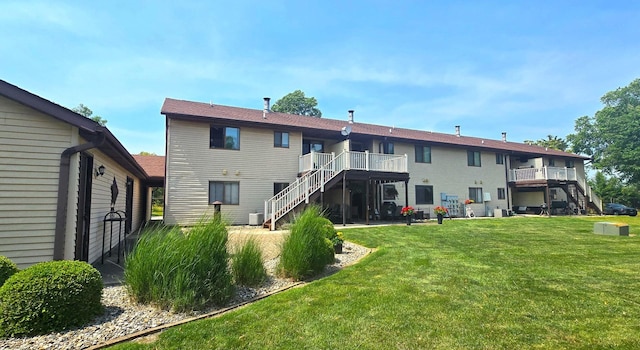 1301 Clifford Ave Unit 8, Urbana, IL 61802 - back of property featuring stairs and a lawn