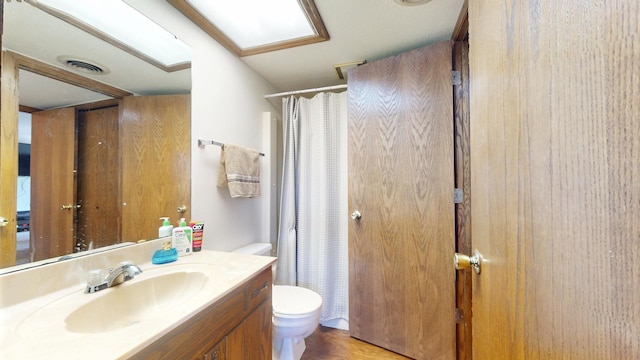 1301 Clifford Ave Unit 8, Urbana, IL 61802 - full bathroom featuring vanity, curtained shower, and wood finished floors