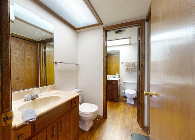 1301 Clifford Ave Unit 8, Urbana, IL 61802 - bathroom with vanity and wood finished floors