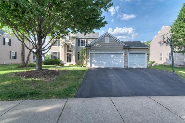 11703 Wolf Creek Ln, Plainfield, IL 60585 - view of front of property with driveway, a front lawn, and a garage