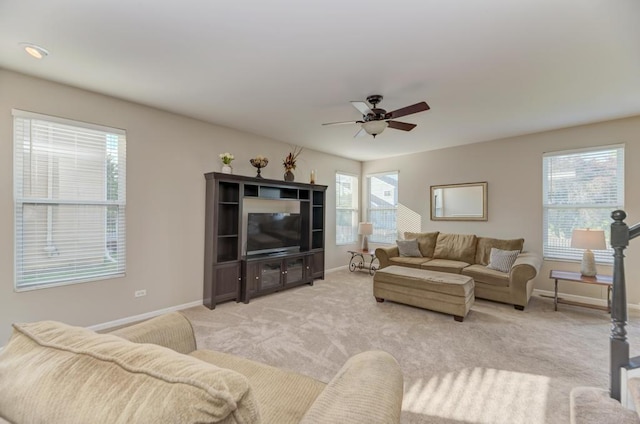 11703 Wolf Creek Ln, Plainfield, IL 60585 - living area featuring a ceiling fan and light carpet