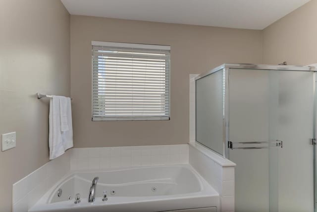 11703 Wolf Creek Ln, Plainfield, IL 60585 - bathroom featuring a shower stall and a tub with jets