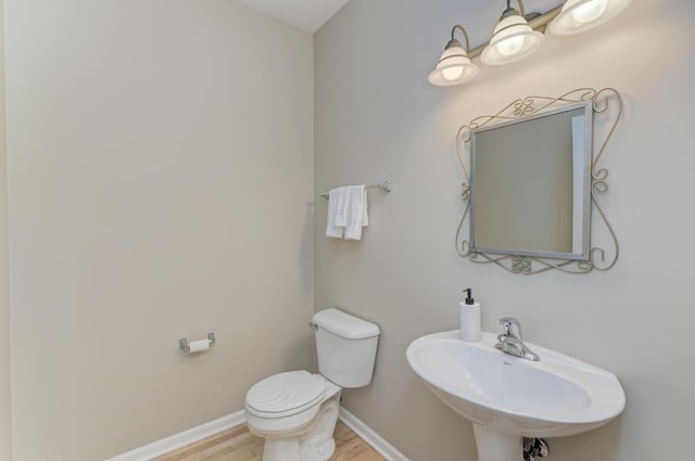 11703 Wolf Creek Ln, Plainfield, IL 60585 - half bath with toilet and wood finished floors
