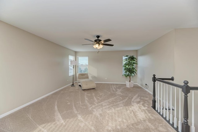 11703 Wolf Creek Ln, Plainfield, IL 60585 - unfurnished room featuring carpet floors, a ceiling fan, and an upstairs landing