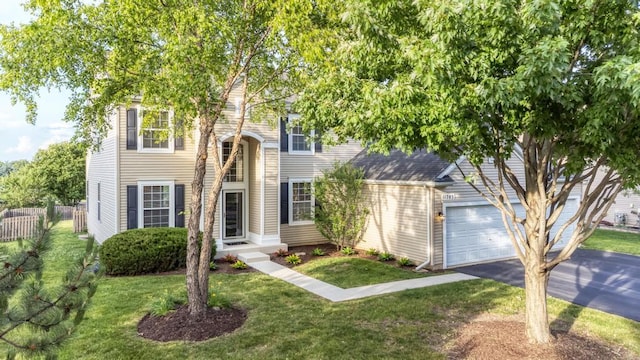 11703 Wolf Creek Ln, Plainfield, IL 60585 - view of front facade featuring driveway and a garage