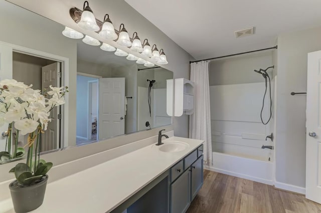 11703 Wolf Creek Ln, Plainfield, IL 60585 - full bath featuring shower / bathtub combination with curtain, vanity, and wood finished floors