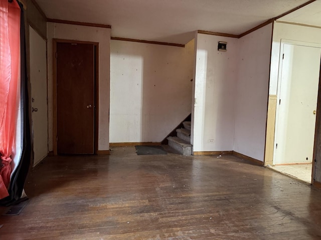 1826 S Kildare Ave, Chicago, IL 60623 - empty room with crown molding, hardwood / wood-style flooring, and stairs