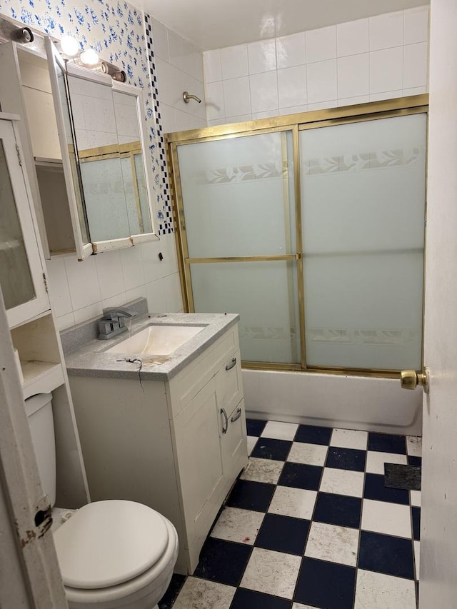 1826 S Kildare Ave, Chicago, IL 60623 - full bathroom with tile patterned floors, vanity, combined bath / shower with glass door, and tile walls