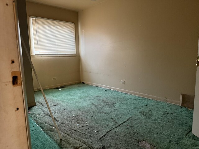 1826 S Kildare Ave, Chicago, IL 60623 - empty room featuring carpet and baseboards