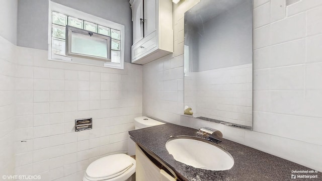 124 E 83rd St, Chicago, IL 60619 - bathroom with tile walls and vanity
