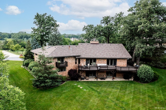 7 Bell Oak Ln, Lemont, IL 60439 - rear view of property featuring a patio, a yard, a deck, a chimney, and brick siding