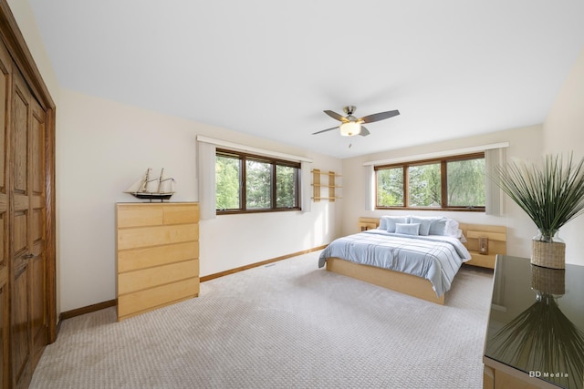 7 Bell Oak Ln, Lemont, IL 60439 - bedroom featuring light colored carpet, multiple windows, a closet, and ceiling fan