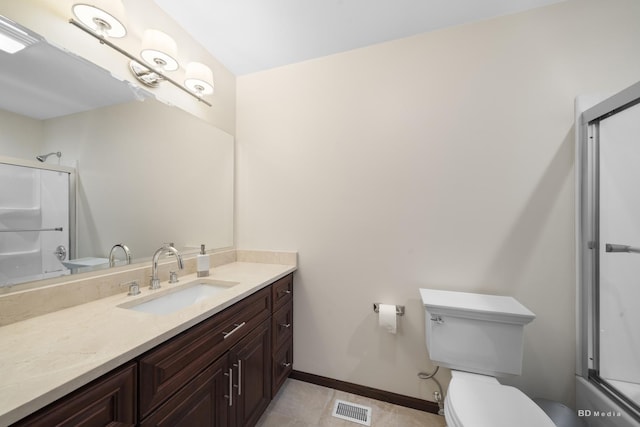 7 Bell Oak Ln, Lemont, IL 60439 - bathroom featuring vanity, enclosed tub / shower combo, and tile patterned flooring