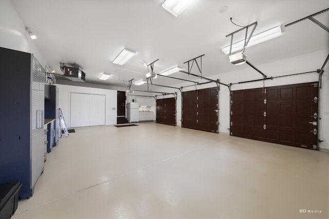 7 Bell Oak Ln, Lemont, IL 60439 - garage with freestanding refrigerator and a garage door opener