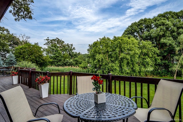 7 Bell Oak Ln, Lemont, IL 60439 - wooden terrace featuring outdoor dining area, a yard, and view of wooded area