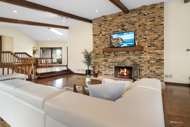 7 Bell Oak Ln, Lemont, IL 60439 - living room with wood finished floors, beamed ceiling, and a brick fireplace