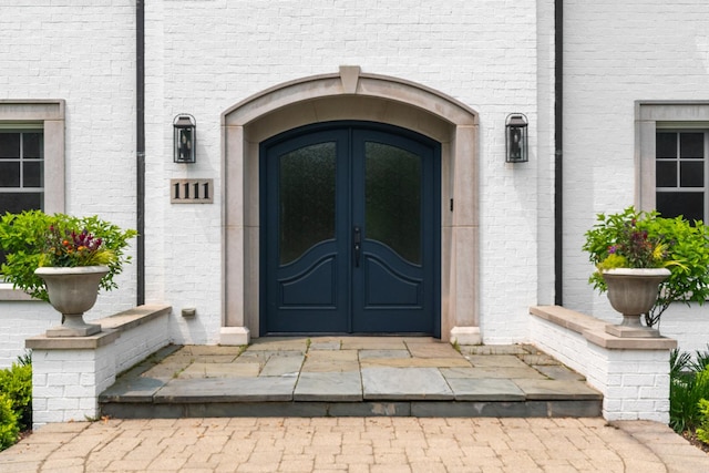 1111 Seneca Rd, Wilmette, IL 60091 - entrance to property with french doors and brick siding