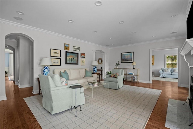 1111 Seneca Rd, Wilmette, IL 60091 - living room featuring arched walkways, crown molding, wood finished floors, and recessed lighting