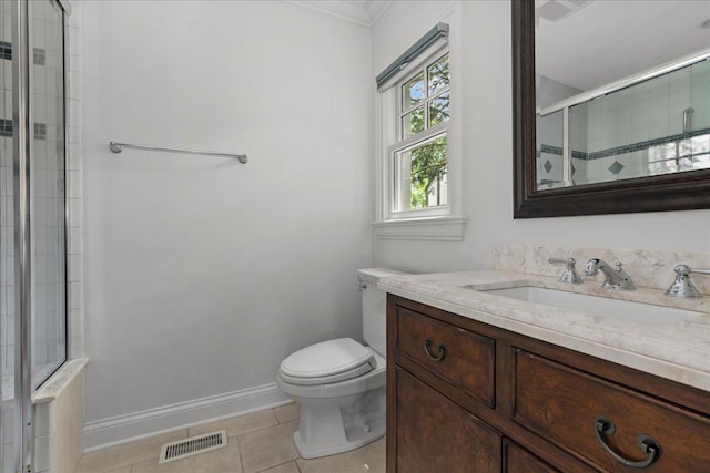 1111 Seneca Rd, Wilmette, IL 60091 - bathroom with vanity, tile patterned flooring, tiled shower, and crown molding