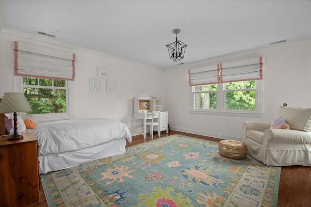 1111 Seneca Rd, Wilmette, IL 60091 - bedroom featuring crown molding and wood finished floors