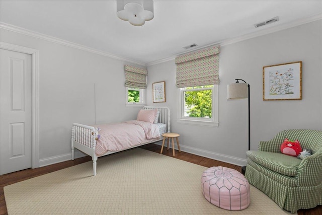 1111 Seneca Rd, Wilmette, IL 60091 - bedroom featuring wood finished floors and ornamental molding